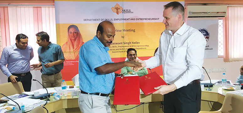 Mario Schmidt(President of UWDMA) and Krishna Kunal, IAS (Commissioner) signing the MoU