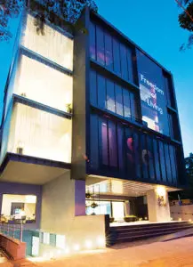 The store design takes a step further by creating a glass box for visual merchandising