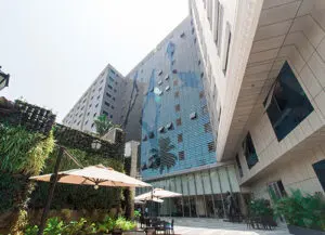 Kanakia WallStreet - Along with Laminam tiles dry cladded on the façade, materials such as aluminium fins and DGU, and SGU glass have also been used