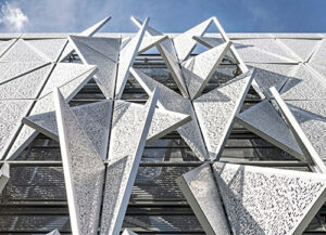 Climate-responsive kinetic façade and a triangular form