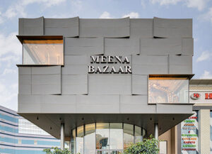 The stunning composition of zinc side-lit panels give the facade a dramatic look during the day as well as night