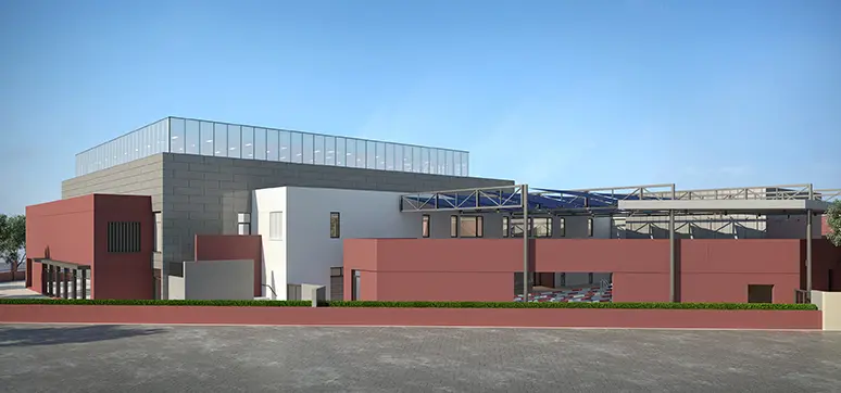 The façade of Dubai College Sports and Performing Arts Centre has laminated frosted glazing