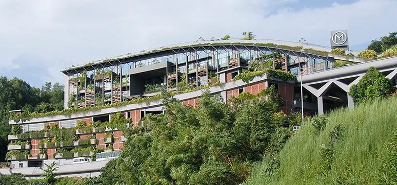 The roof is designed as a landscaped gathering space which slopes all the way down to the ground