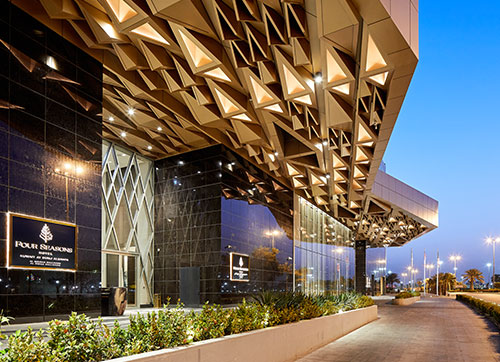 The development is unified by a traditional Arabian carved wood in architectural design