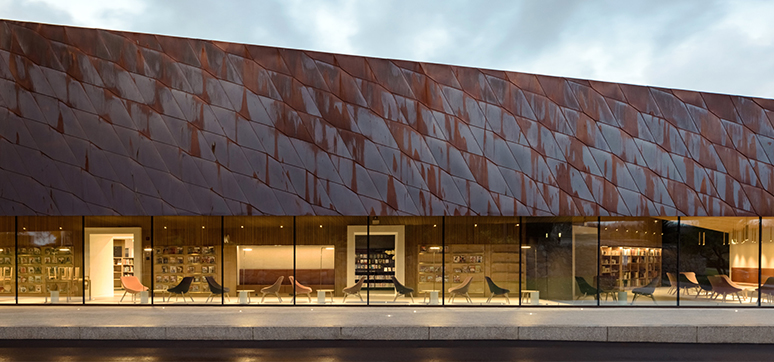 Public Library in Finland with a Copper-Clad Expansion