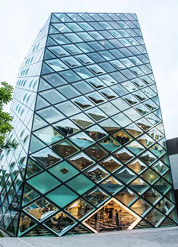 Curved glass PRADA building in Japan by Herzog De Meuron