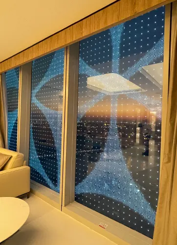 The View Hospital, Qatar. The view through the media façade from inside when the LEDs are operational