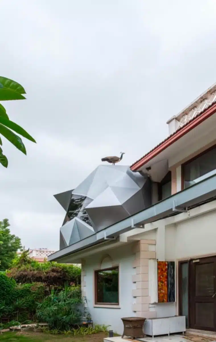 In Symbiotic Parasite, the angular overhang acts as a functional sculpture, blending precise geometry with utility.