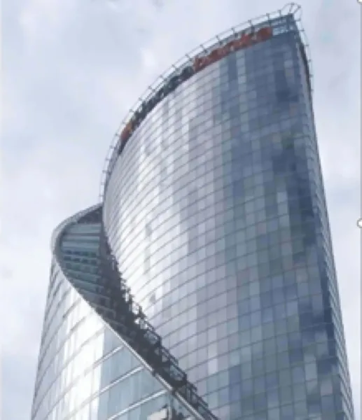 Climbing monorails ascending around building to access elevations