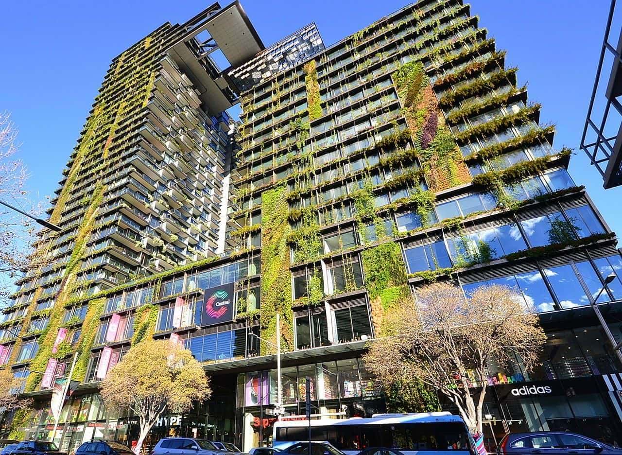 One Central Park, Sydney – vertical garden façade designed by botanist Patrick Blanc covering over 50 % of the tower surfaces, using 250+ plant species to enhance microclimate, biodiversity, and visual connection to nature