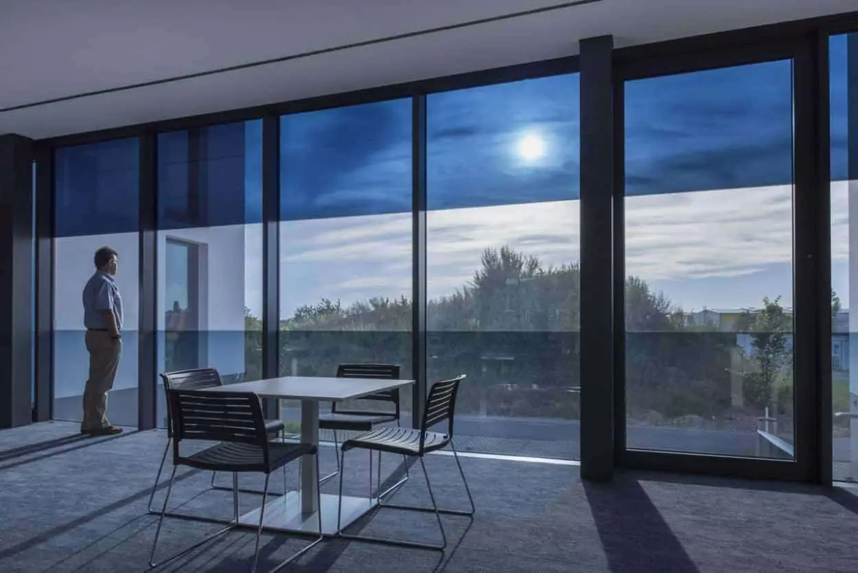 SageGlass electrochromic glazing in action windows transition through clear, light, and medium tint levels to balance daylight, glare, and solar heat, mimicking natural stomatal response for enhanced comfort and efficiency