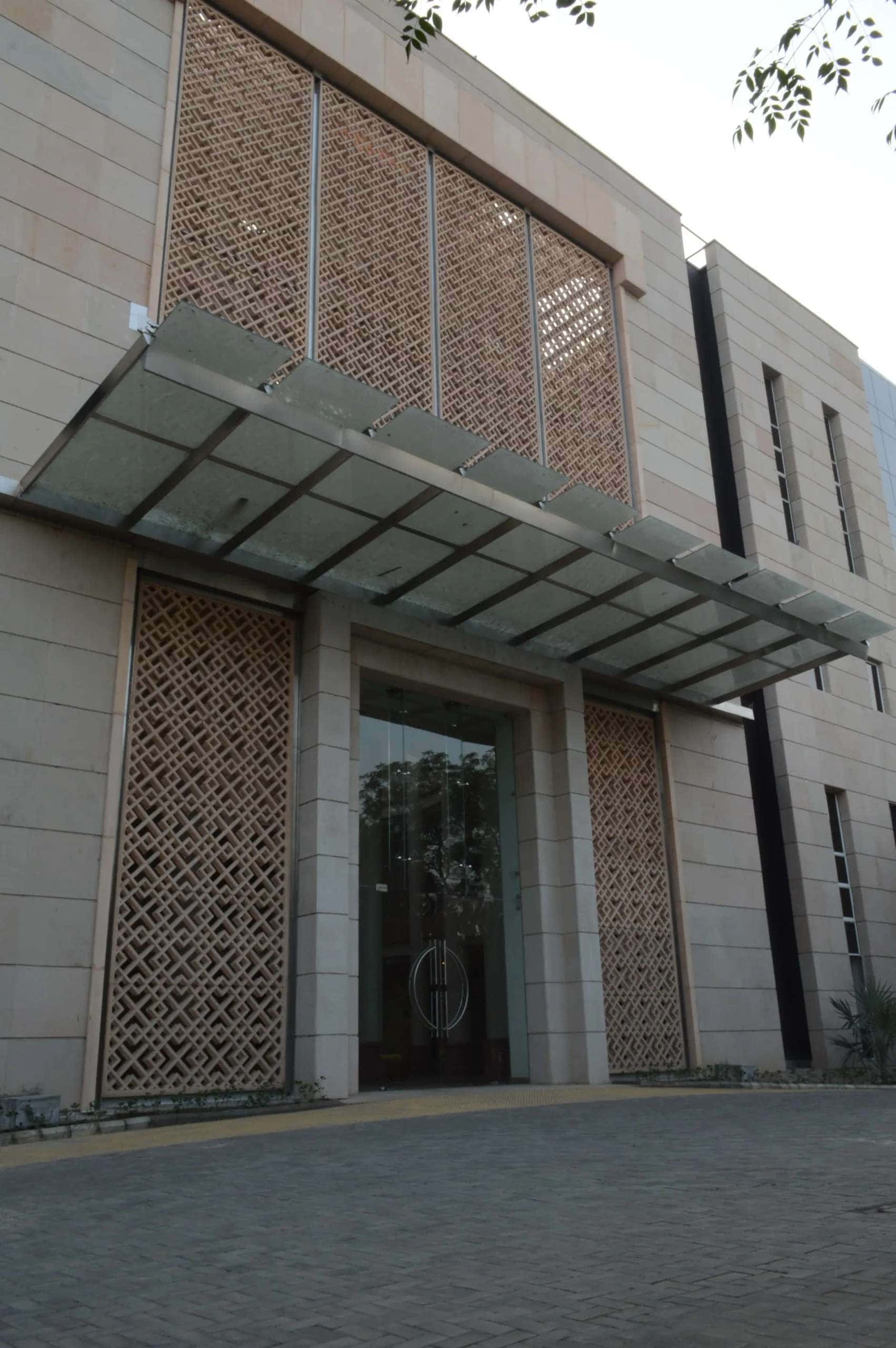 The façade integrates IGUs as a core performance element