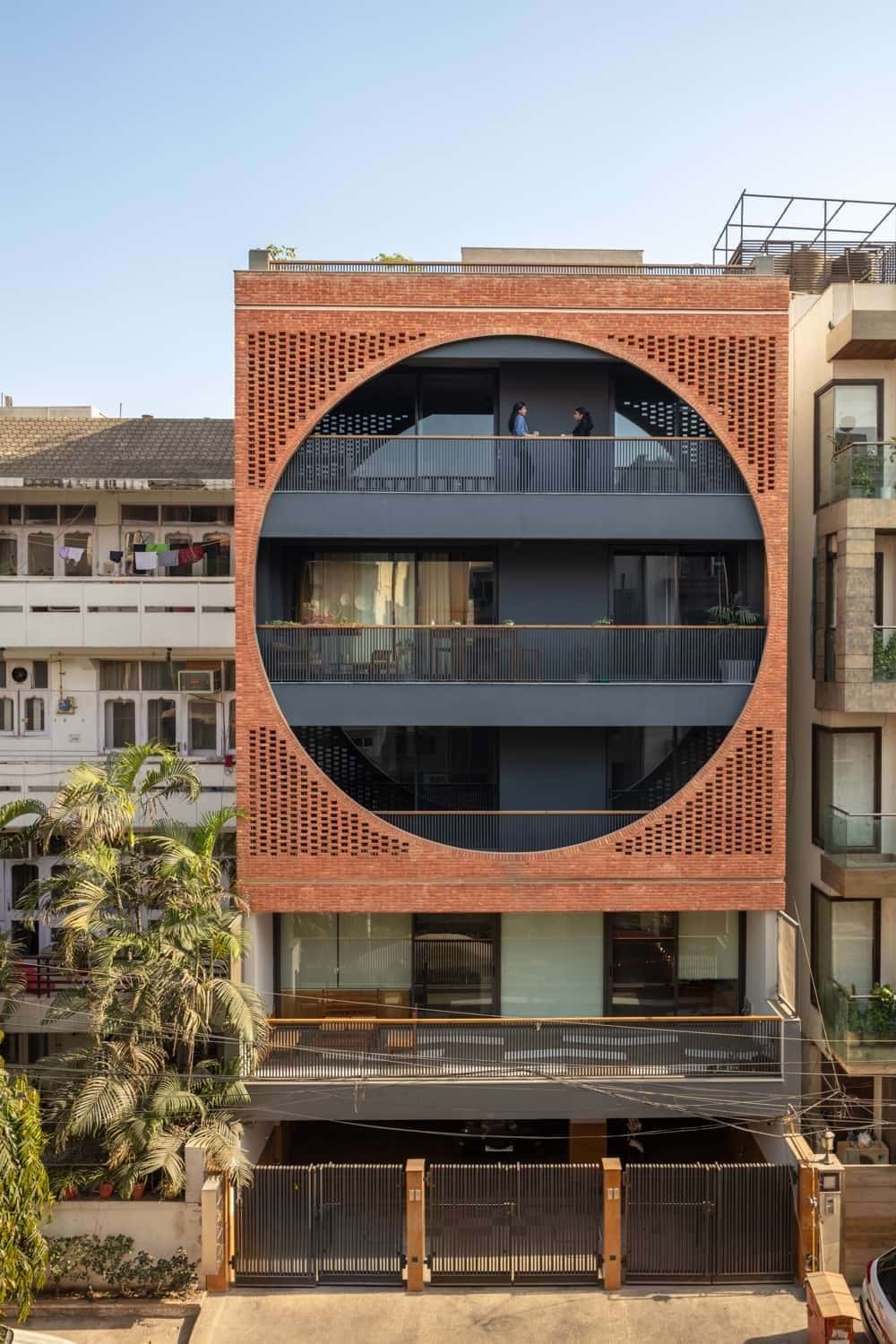 Safdarjang Residence - a monumental circular aperture sits within a square brick screen
