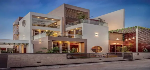 The Stepped Cube House appears as a set of cubes with varied volumes, arranged with a balanced play of solids and voids. A project by Prashant Parmar Architects