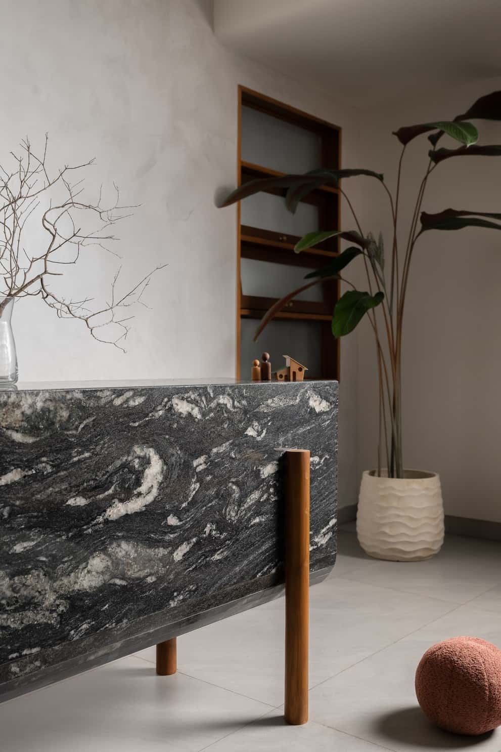 The design culminates in a seamless indoor-outdoor experience, with fully operable windows and doors inviting occupants to engage with the surrounding greenery