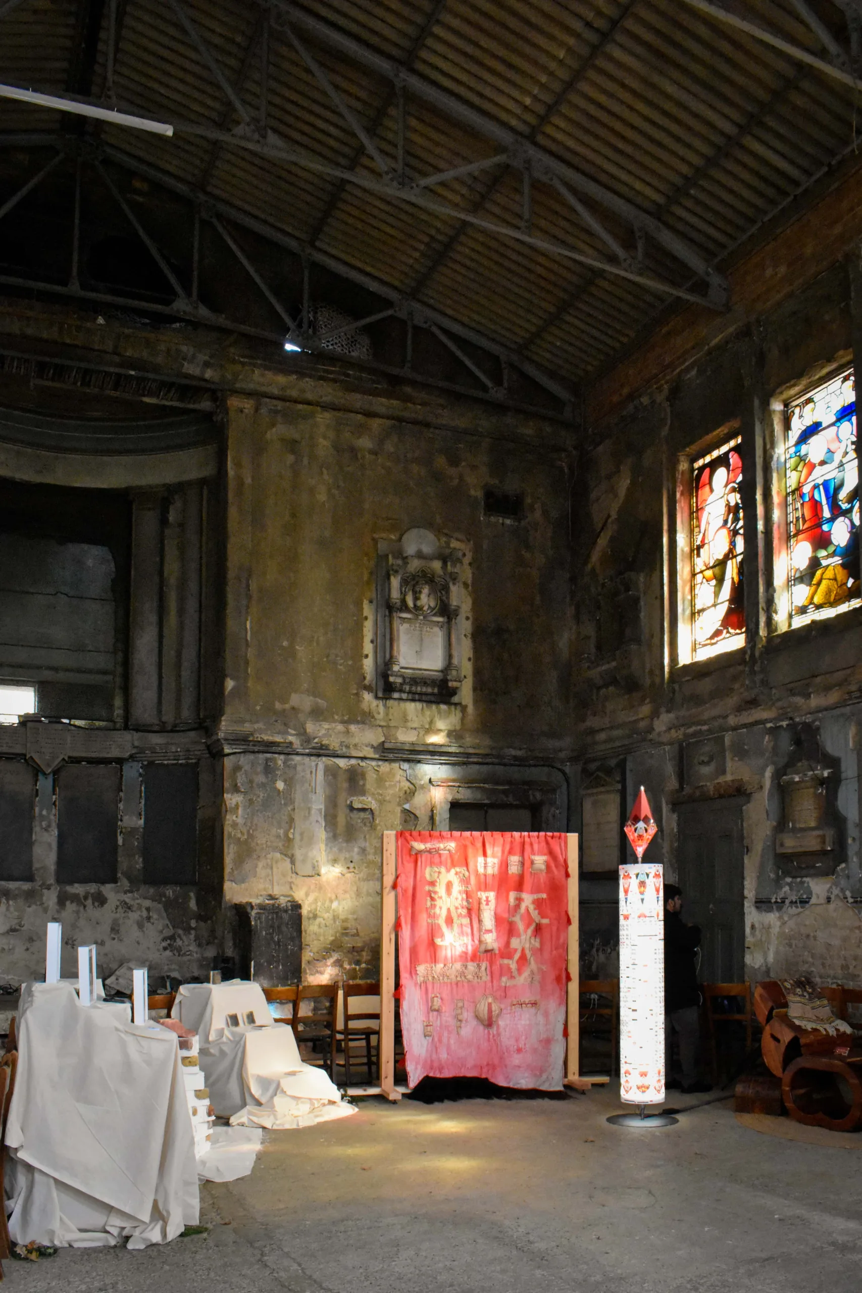 Recycled coloured glass, inspired by eighteenth-century palettes, was added to broken bays to cast shifting light throughout the day