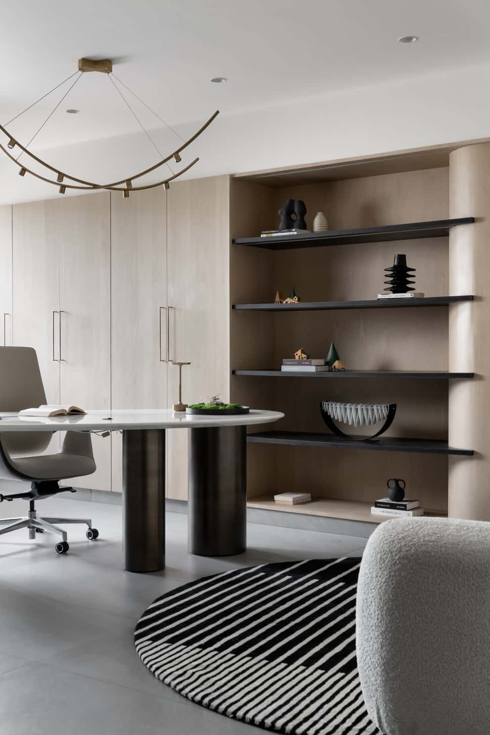 The design culminates in a seamless indoor-outdoor experience, with fully operable windows and doors inviting occupants to engage with the surrounding greenery