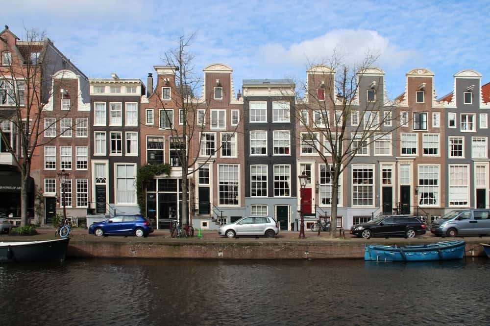 The Edge, Amsterdam - The building’s façade incorporates electrochromic glass that adjusts its tint based on the sun’s position