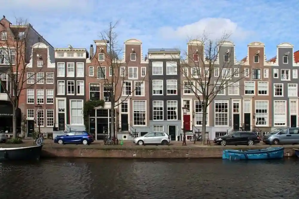 The Edge, Amsterdam - The building’s façade incorporates electrochromic glass that adjusts its tint based on the sun’s position