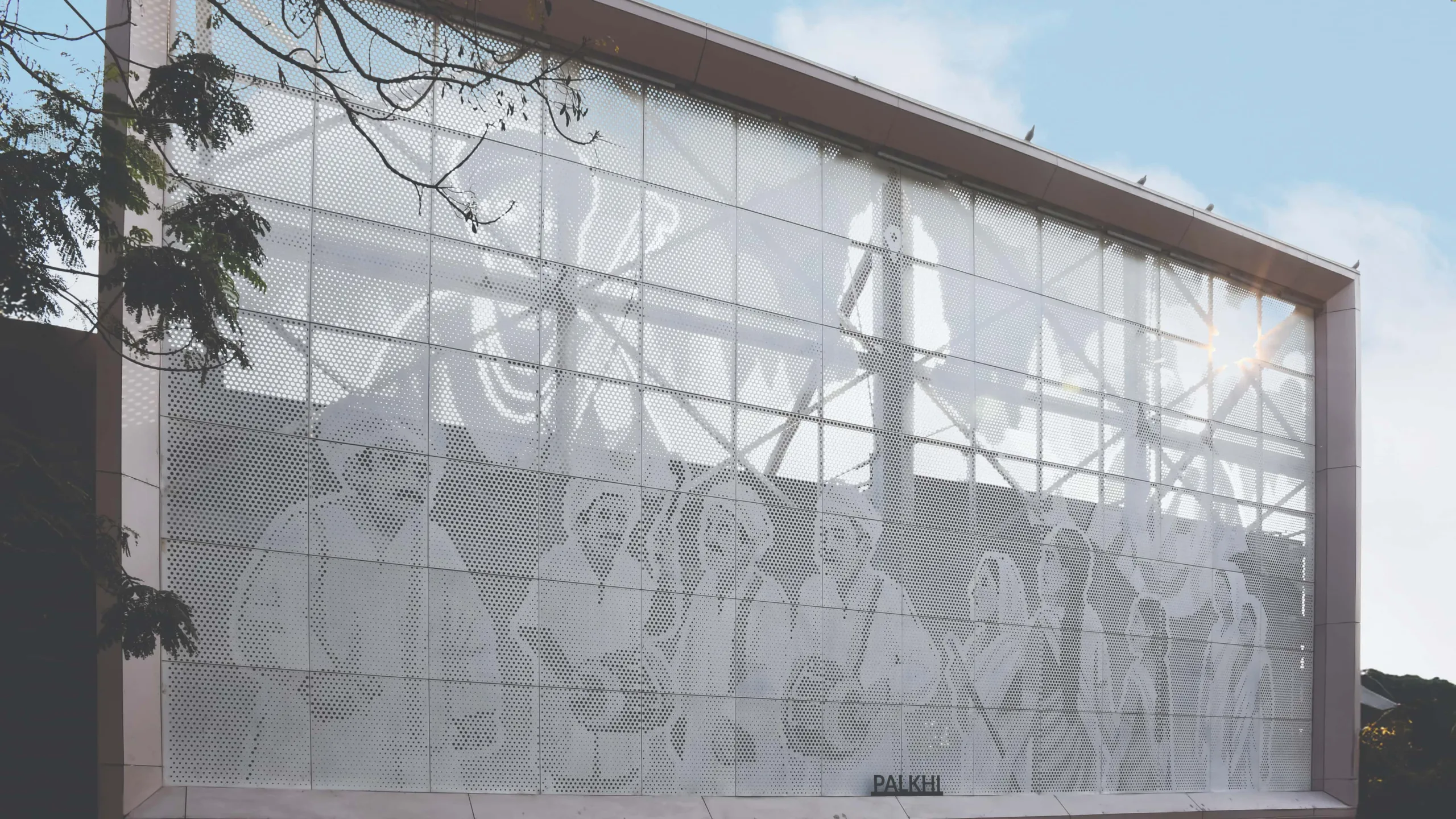 Linear view of the façade panels, illustrating continuity of narrative across the railway station