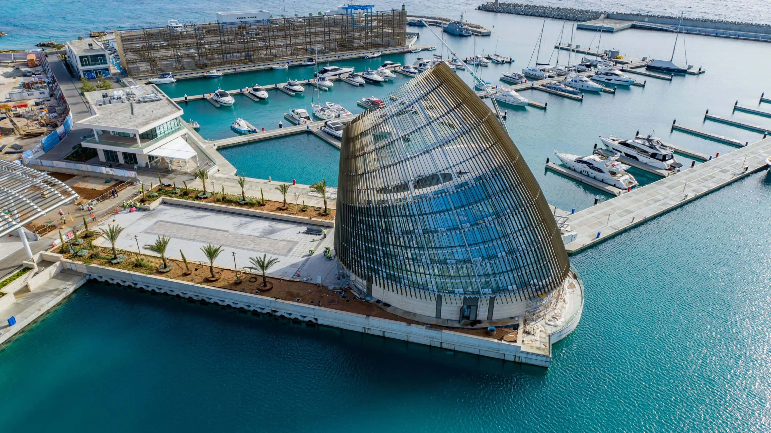 Curved aluminium louvers embrace the overall structure - Ayia Napa Marina, providing aesthetic character and enhanced shading (Image Credit – Alumil India)