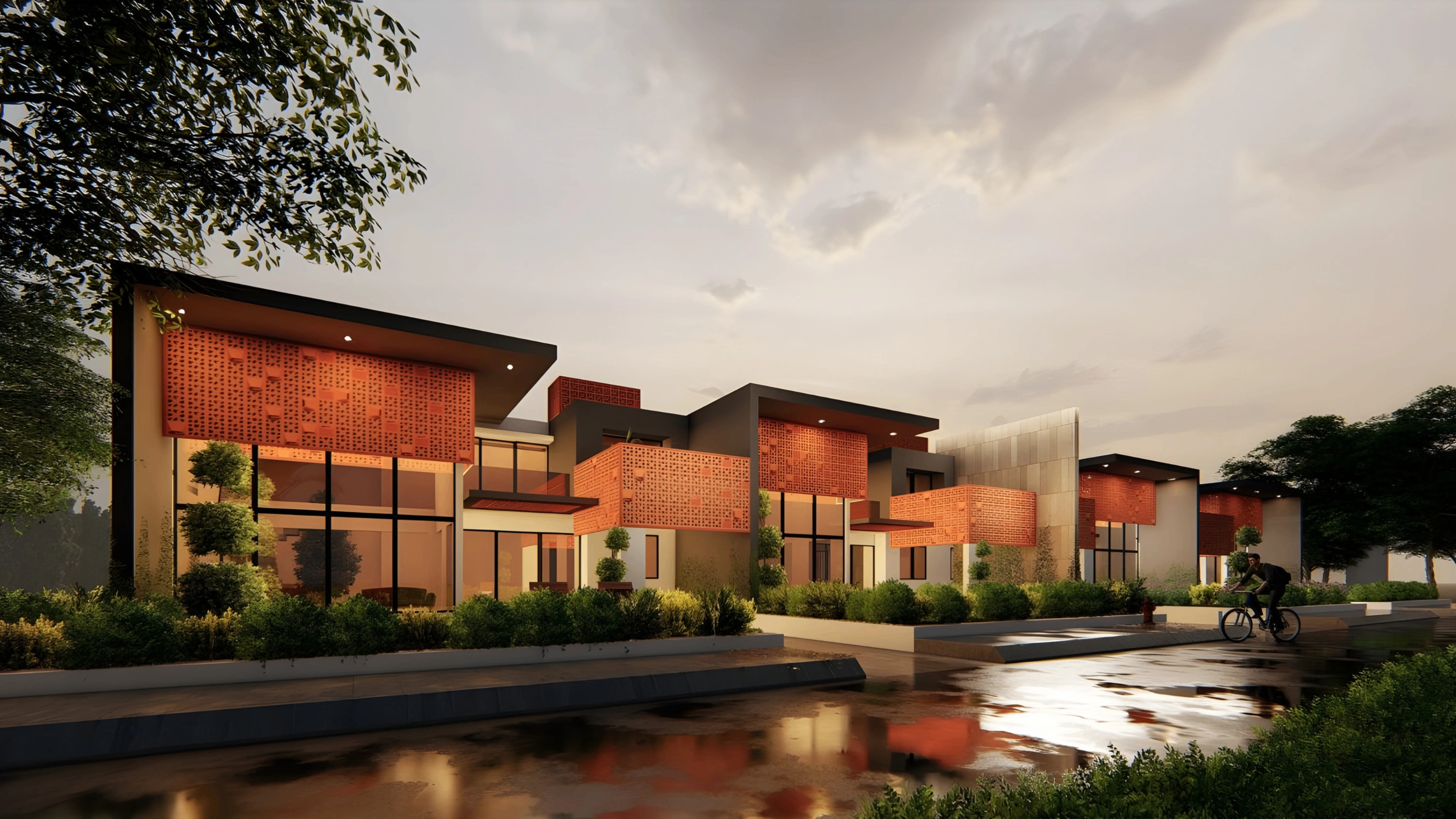 In these row houses, the earthy porcelain jali is integrated into the extended roofline as a high-performance thermal filter. (Image Credit - Aedium Design)