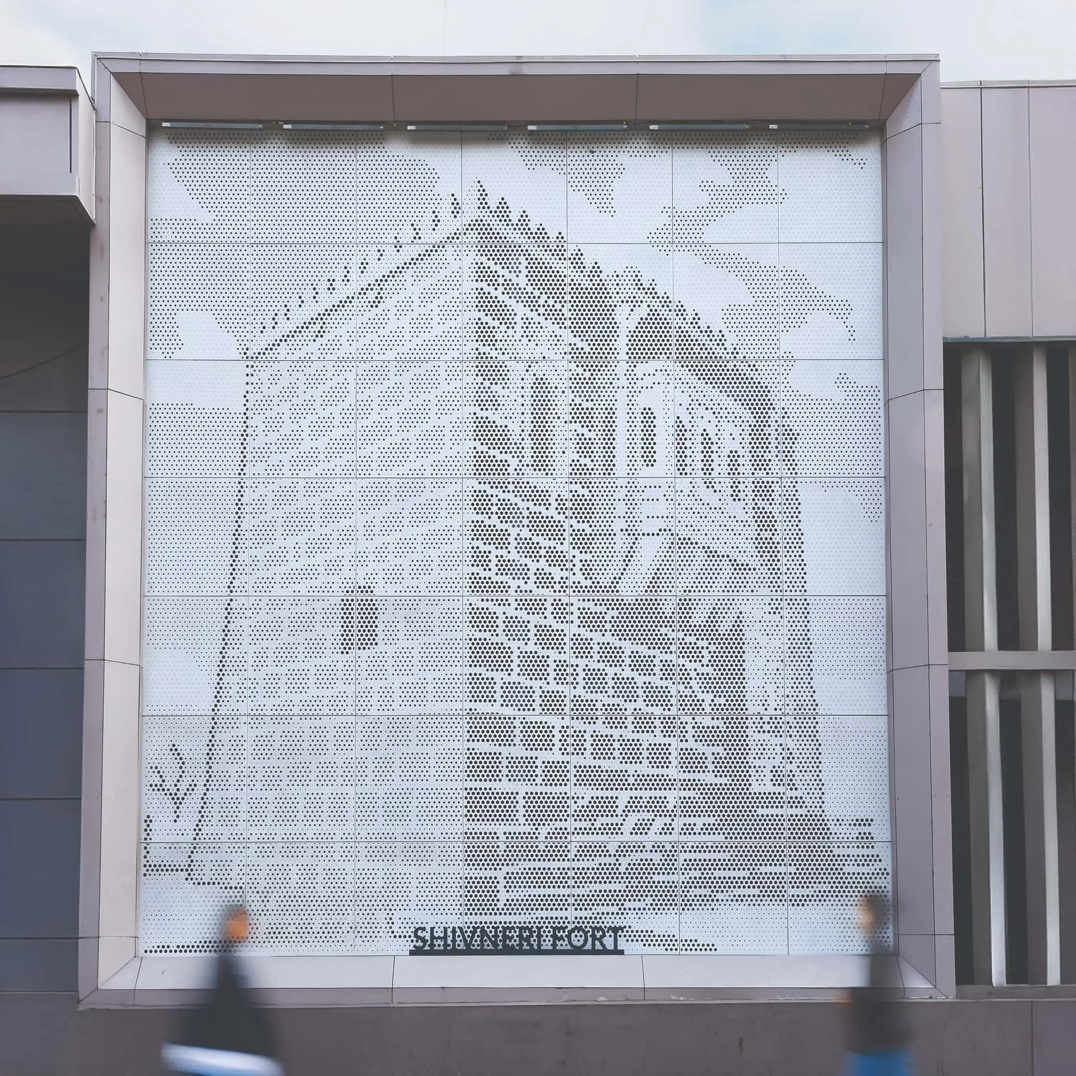 Shivneri Fort expressed through a dynamic perforated façade composition