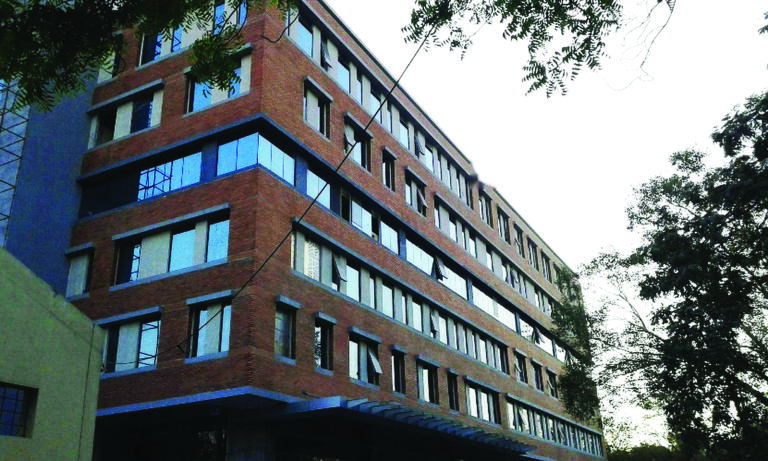 Guntur Office (Agri Business HQ) a double-wall section of AAC block, air gap and Kerala brick, engineered with masons brought in specifically for the detail