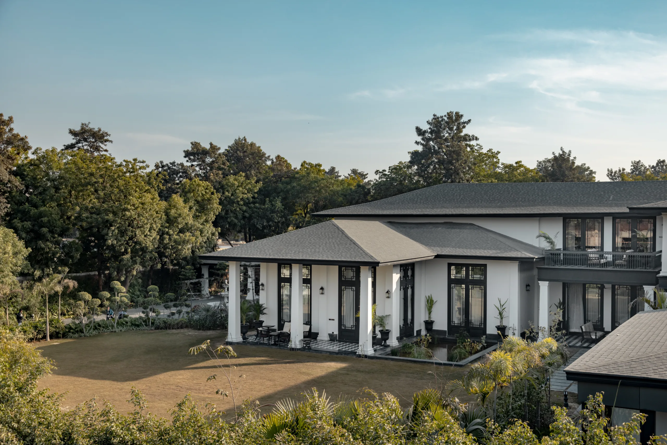 House Of Verandahs In New Delhi: The Verandas Setting The Building Back From The Street With Wrap-Around Verandahs Achieves Quiet Indoors Without Specialised Glazing (Image Credit – GroupDCA, Photographer Credits: Hortontech Interiors)