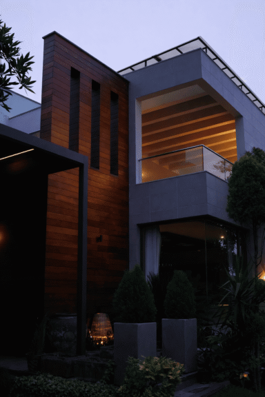 Landscape completes the façade, turning elevation into experience