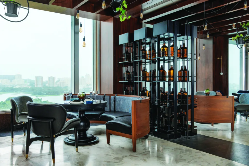 Nox, Mumbai, Replete with exposed bricks, subway lights and graffiti, exposed oxidised metal helps in creating an ambience of a chic industrial bar
