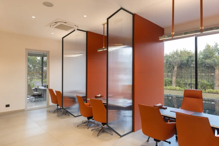 Slatted screens filter light while reducing heat gain and dependence on air conditioning.