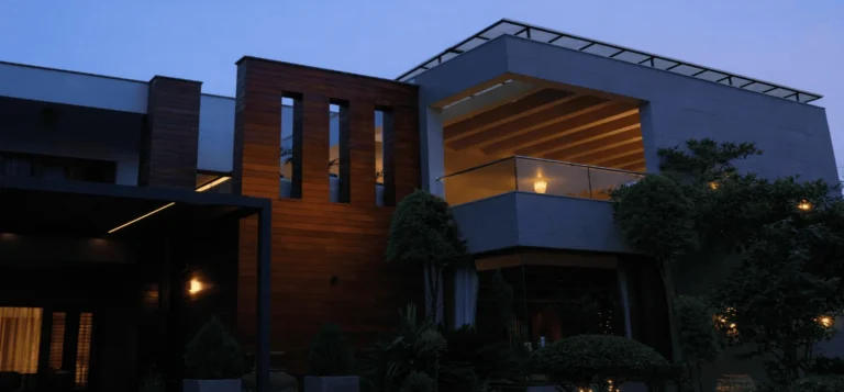 Structure and foliage read together in the evening light