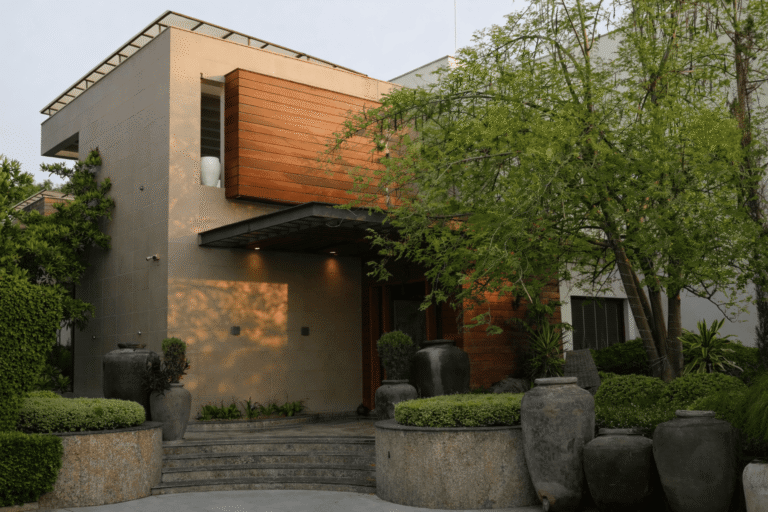 The Timber Tile Residence - Arrival is shaped jointly by architecture and landscape