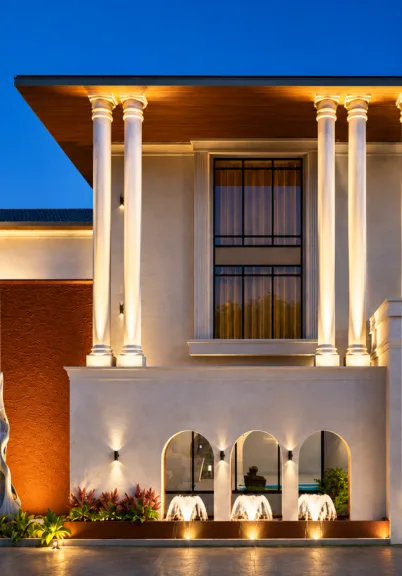 The columns create a sense of scale. The clean volumes provide a modern background