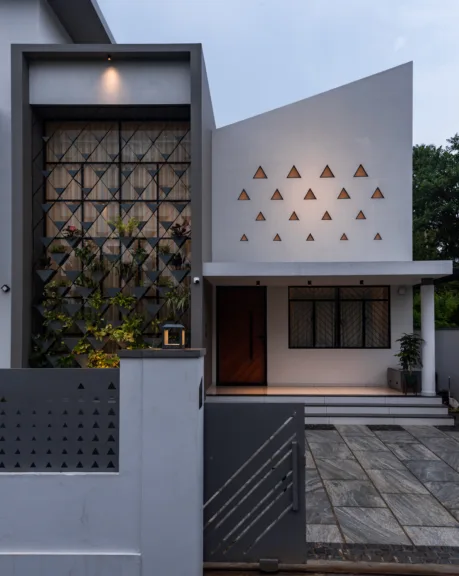 The integrated planter façade forms a green buffer in front of the north-facing glazing, modulating seasonal daylight while simultaneously providing shade, privacy, vegetation and a softer transition between the interior and exterior (Image Credit – Raving Dots Studio)