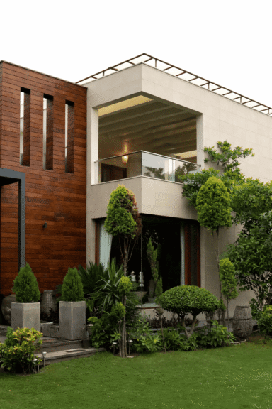Timber, stone, and planting layer into a single, cohesive façade